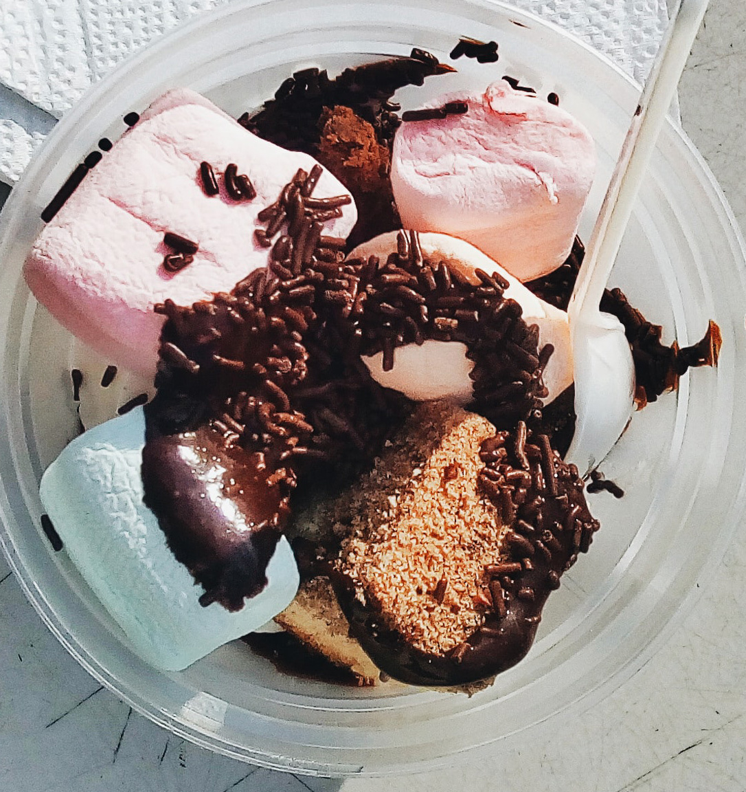 Colossal sized brownie sundae with sprinkles on top
