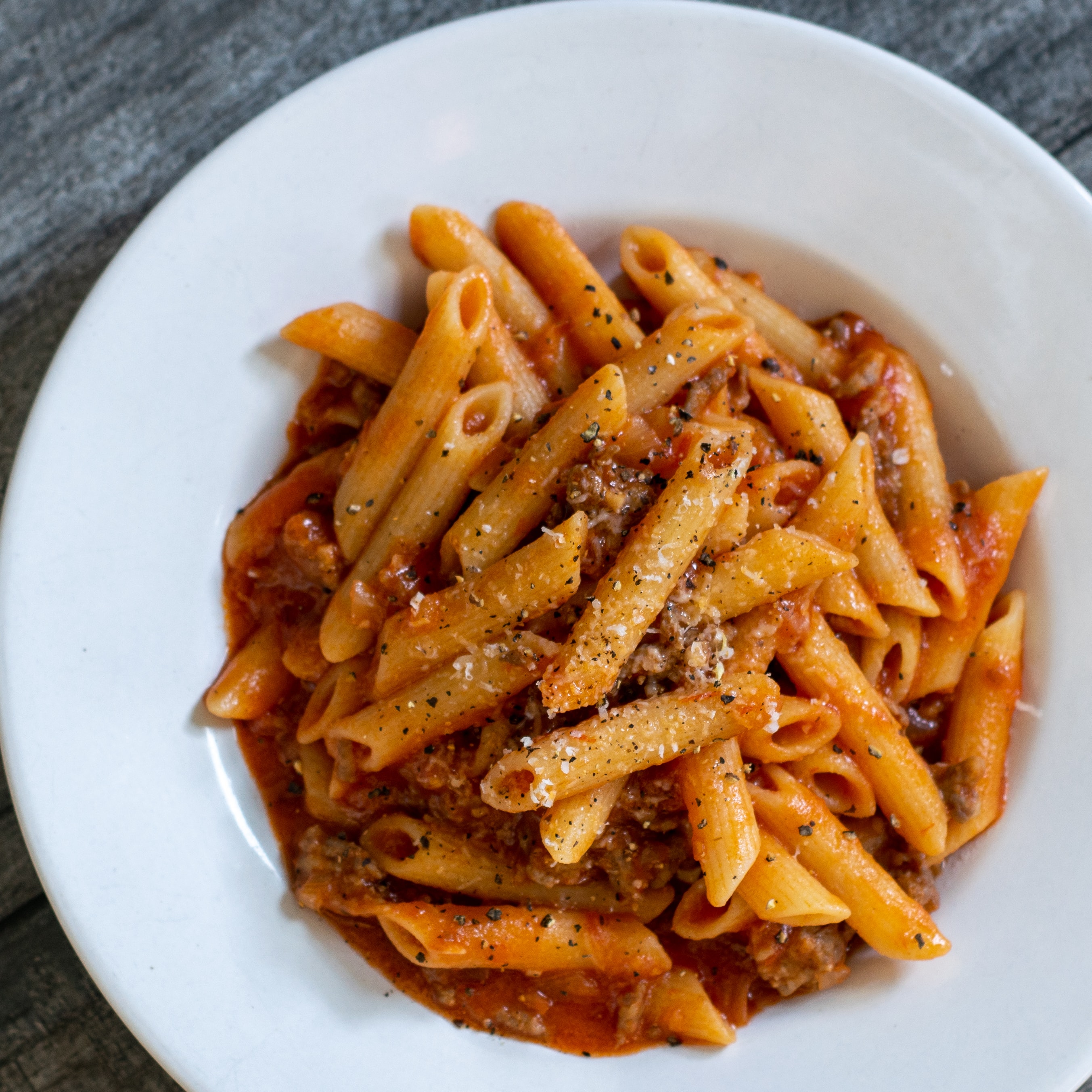 Baked Ziti with bread crumbs and sprinkled with parmesan