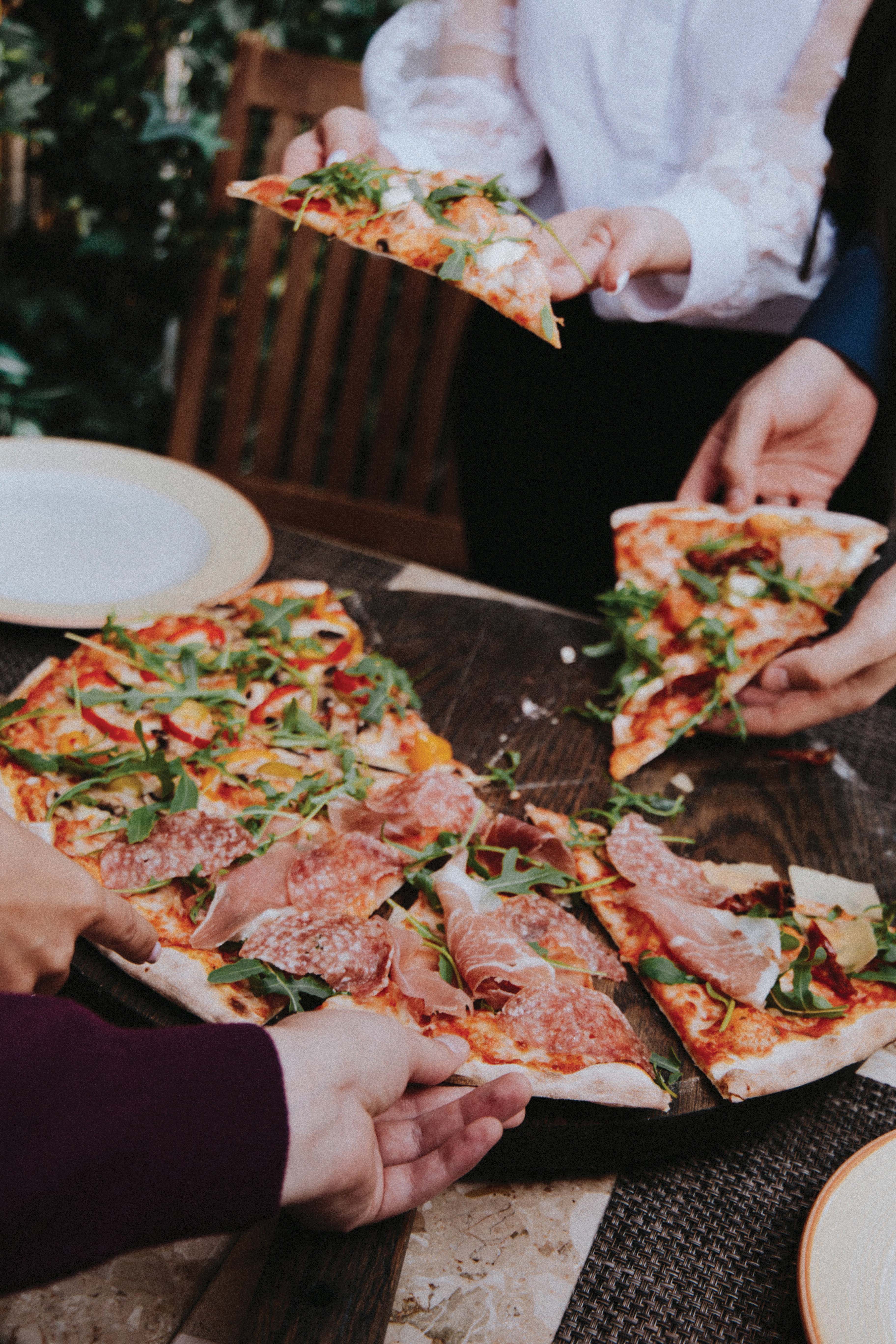 Sharing Spicy Arrabbiata Pizza with many toppings